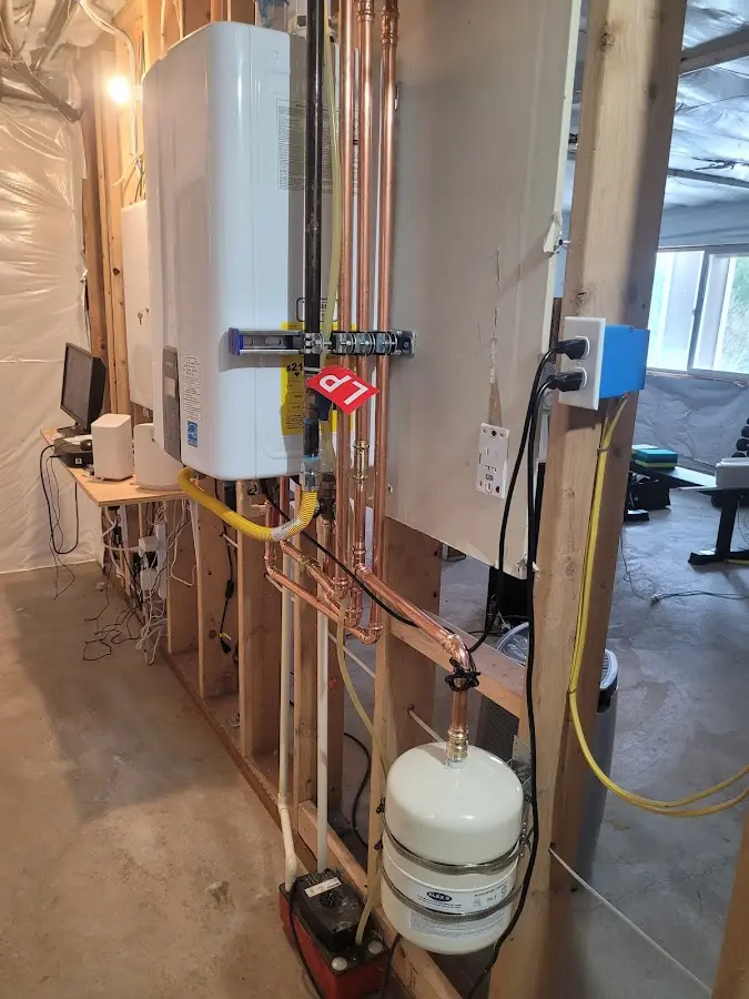 Licensed plumber repairing a kitchen sink in Youngstown